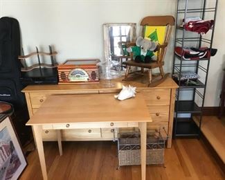 empty guitar case, deks, child's rocking chair, Babar, radio