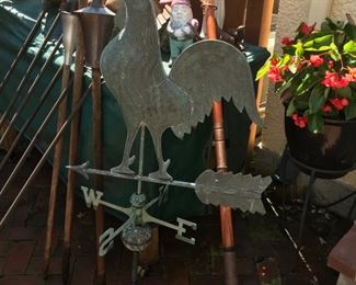 very large and sturdy rooster weathervane that had been on garage, tiki torches, massive wooden flag pole with American flag
