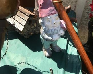 gnome, stone and wood bird house