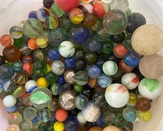 Collection of old marbles, bucket full