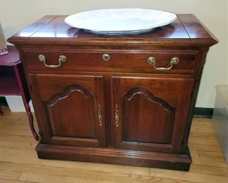 matching Pennsylvania House buffet cabinet with heat tempered suface
