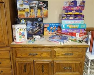 Matching wood cabinet. Games and toys