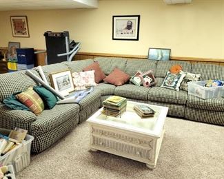 Large green checkered sectional, with full/queen sleeper, the other side reclines!! White wicker coffee table 