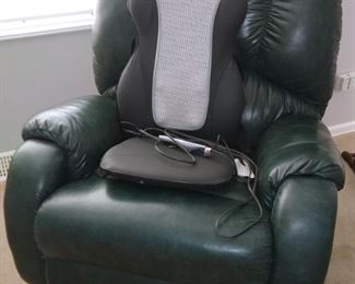 Green faux leather recliner. Back massager