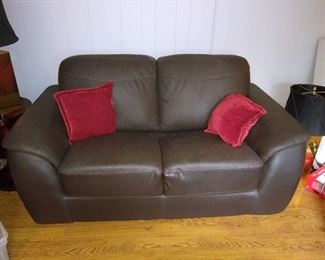 Brown faux leather loveseat