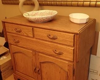 OAK SERVER WITH 2 - DROP SIDE FOR EXTRA SERVING SPACE.