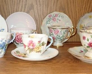 ASSORTED TEA CUPS AND SAUCERS
