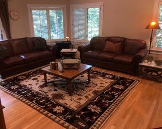 Quality leather sofas beautifully rug