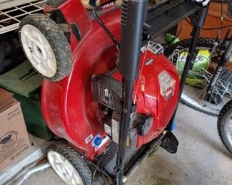 Almost new self-paced Toro lawn mower - fold up for easy storage