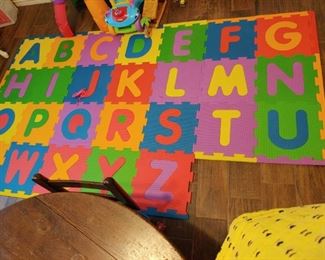 Alphabet snap together floor mat