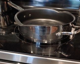 Teflon coated pan that can be poured from either side