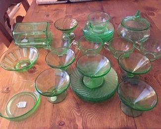 Green Depression Glass Pieces: bowls, rectangle butter dish, sherbert glasses with saucers.  $175.00.  Very good condition.