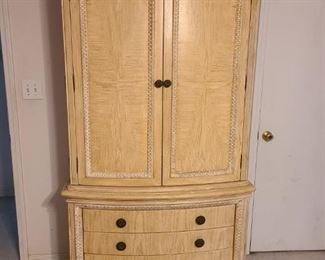 Beautiful solid blonde wood multi-functional armoire. Behind doors ~ 3 removable shelves + extra drawer