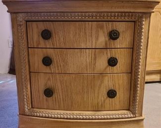 Beautiful blonde wood 3 drawer night stand - We have 2