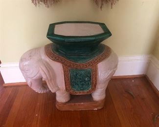 elephant with strange deformity on its back