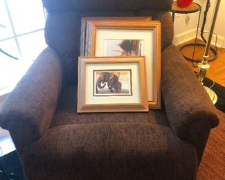 Chocolate lab chair presents her puppies