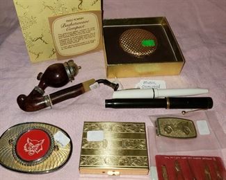 Vintage compacts, fountain pens, Central High School belt buckle, and other neat items