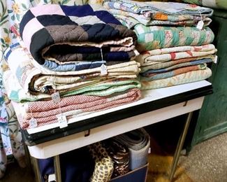 Lots of vintage quilts! Some are in good vintage condition and others would be great for repurposing!