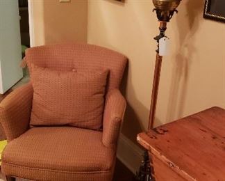 upholstered chair,  floor lamp, framed animal print art