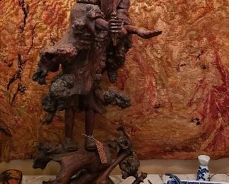  Chinese old man made of ironwood?; tapestry