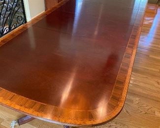 Band top dining table by Councill, 2 leaves.