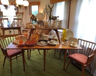 Conant Ball dining table and chairs, by Leslie Diamond.
Heywood Wakefield coffee table.
Lenox china.