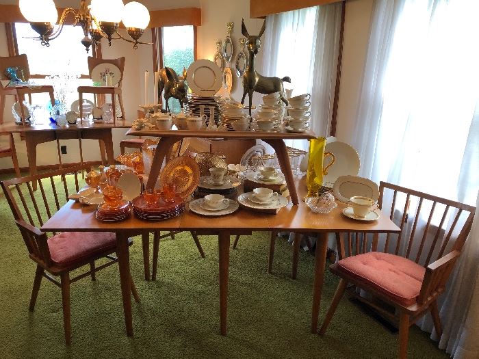 Conant Ball dining table and chairs, by Leslie Diamond. 
Heywood Wakefield coffee table. 
Lenox china. 