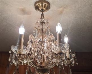 One of a pair of vintage crystal chandeliers.