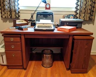 Vintage 3-piece Modular Teak Desk, #770, by D-Scan Furn. Co., with two roll-out sides, vintage Smith-Corona "Galaxie" portable typewriter.                                                                   D-Scan was founded in 1968 and began producing Scandinavian-styled furniture in Singapore in the mid-1970s.