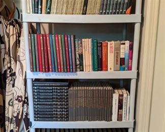 Books-a-plenty, along with some groovy curtain panels, from a land far away, that time forgot.