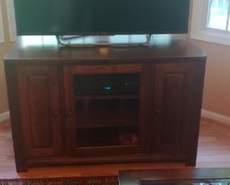 Smart Flat screen and stand, area rug, tables