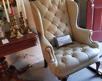 Leather chair, one of a pair