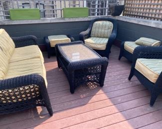 Patio Furniture: Wicker Sofa and 2 Armchairs. 2 Ottomans and 1 Coffee Table.