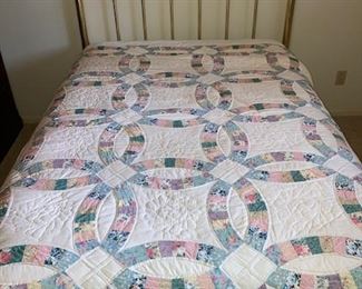 full size brass bed and vintage quilt