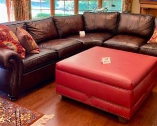 Lot 2100 $1,995.00 Bernhardt Warm Coffee Leather Sectional Sofa. Crafted with purposeful gradients of brown. Great Shape (curved corner). 2 pieces. Rolled Arms with Nailhead trim in a very fine buttery leather. Wooden Feet. Purchased at Walter E Smithe. Very Light signs of wear on the piping and cushions, but this could be intentional distress, and definitely no major issues are seen. 101" each side. x 39" deep x 40" h to back, 19.5" to seat cushion. Would fit in any style decor, family room, or rec room. Elegant. (Safe, throw pillows, and ottoman sold seperately)