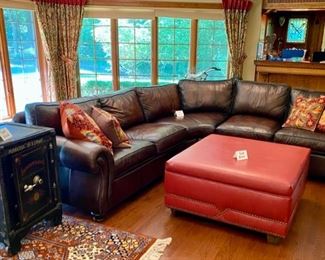 Lot 2100 $1,995.00 Bernhardt Warm Coffee Leather Sectional Sofa. Crafted with purposeful gradients of brown. Great Shape (curved corner). 2 pieces. Rolled Arms with Nailhead trim in a very fine buttery leather. Wooden Feet. Purchased at Walter E Smithe. Very Light signs of wear on the piping and cushions, but this could be intentional distress, and definitely no major issues are seen. 101" each side. x 39" deep x 40" h to back, 19.5" to seat cushion. Would fit in any style decor, family room, or rec room. Elegant. (Safe, throw pillows, and ottoman sold seperately)