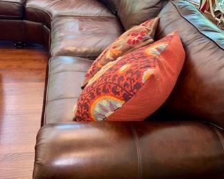 Lot 2100 $1,995.00 Bernhardt Warm Coffee Leather Sectional Sofa. Crafted with purposeful gradients of brown. Great Shape (curved corner). 2 pieces. Rolled Arms with Nailhead trim in a very fine buttery leather. Wooden Feet. Purchased at Walter E Smithe. Very Light signs of wear on the piping and cushions, but this could be intentional distress, and definitely no major issues are seen. 101" each side. x 39" deep x 40" h to back, 19.5" to seat cushion. Would fit in any style decor, family room, or rec room. Elegant. (Safe, throw pillows, and ottoman sold seperately)