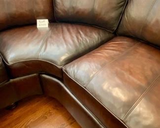 Lot 2100 $1,995.00 Bernhardt Warm Coffee Leather Sectional Sofa. Crafted with purposeful gradients of brown. Great Shape (curved corner). 2 pieces. Rolled Arms with Nailhead trim in a very fine buttery leather. Wooden Feet. Purchased at Walter E Smithe. Very Light signs of wear on the piping and cushions, but this could be intentional distress, and definitely no major issues are seen. 101" each side. x 39" deep x 40" h to back, 19.5" to seat cushion. Would fit in any style decor, family room, or rec room. Elegant. (Safe, throw pillows, and ottoman sold seperately)