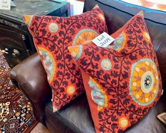Lot 2104 $95.00. 2 Canaan Co Pillows. Tribal Thread - Rust Pillows. Down Filled. Medallion embellished. Paid $300 20" Sq.