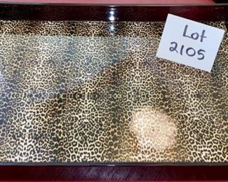 Lot 2105 $14.00 Serving Tray Charge it by Jay. Rectangular with Leopard Print and black. Laminated, would be great for a drink tray, or as owners used as a cocktail table tray atop an ottoman. Spot there is a light reflection from the flash. 14" W x 19" L