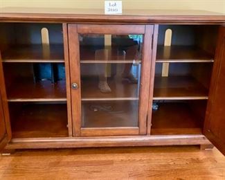 Lot #2110. $575.00. Hooker Media Center Console