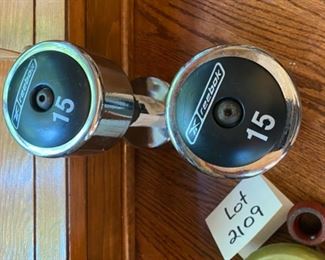 Lot 2109 $30.00 2 Reebok Dumbbells (15#), 2 2# weights, 2 Hand Weights with a Bar, and a Flex-Weights by ProMate Bar.