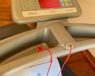 Lot 2117 $200.00 Life Fitness Treadmill - Model TR-5500 9343, 120 VAC, 60hz 12 amps, 7 black pad cushion.