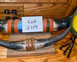 Lot 2119 $75.00 Plaque with two sets of Steer Horns (real) and a cute Parrot candle on legs