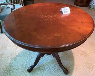 Lot 2120 $325.00. Beautiful Inlaid, round foyer table with leaf design. 39" Round x 30" H