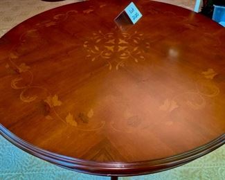 Lot 2120 $325.00. Beautiful Inlaid, round foyer table with leaf design. 39"R x 30" H