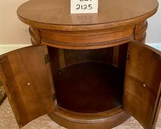 Lot 2125 $95.00 Thomasville Drum Table. Some water marks on top of the Table. This screams, "sand me down and restain or paint me!" It's made like the proverbial brick s**thouse. Do it! A steal at half price.