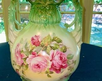 Lot 2128 $75.00 Vintage porcelain vase green and pink floral rose pattern. Signed "Austria" with artists mark. 14" H x 8" W Imagine the time and skill to paint roses on porcelain like this. Grab a piece of history, and buy now!!Or stash it away and give it as a fab gift for Christmas. It's got Class and Character!