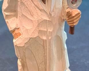 Lot 2137 $50.00 Ophthalmologist wood carvings. First is Dr. with an eye chart and an Ophthalmologist wood carving of a Dr with a magnifying glass and the verbiage, "I'm crazy about your eyes, madam." Made in Austria by Jaschke Preizel 11"H x 7" base