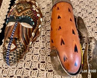 Lot 2160, $40.00. Vintage Mask with shells and beads from Zaire, Carved gourd African water carrier.
